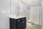 Lower level full bathroom with a shower tub combo 